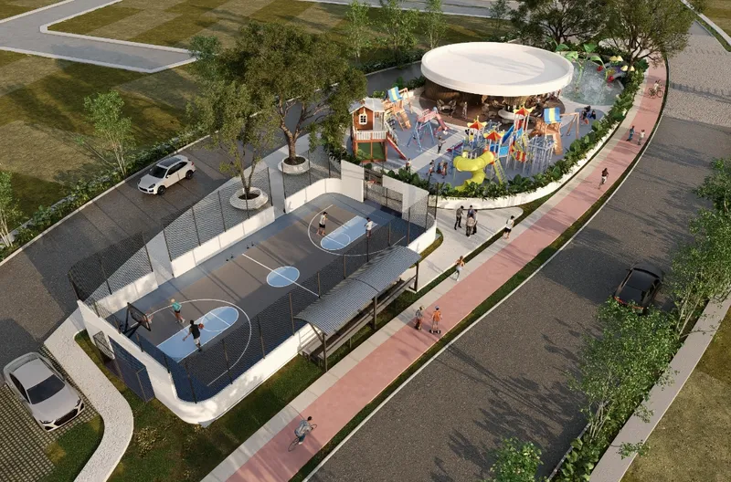 Vista aérea del Kids Club, con juegos infantiles y cancha